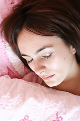 Image showing Beautiful young woman sleeping.