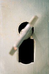 Image showing Key in a keyhole