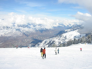 Image showing Skiers on top