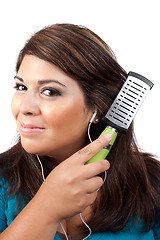 Image showing Woman Brushing Her Hair