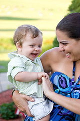 Image showing Happy Mother Holding Her Baby