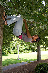 Image showing Woman Hanging from a Tree