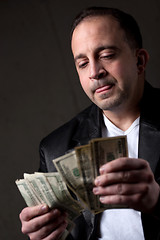 Image showing Man Counting Money