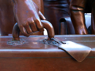 Image showing Hand at the suit-case