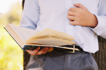 Image showing Book in child hands