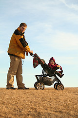 Image showing father with stroller