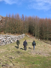 Image showing Three men tracking