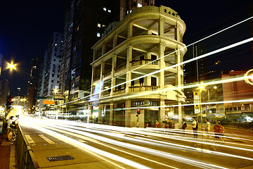 Image showing Fast moving cars at night 