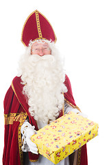 Image showing Sinterklaas is giving a present