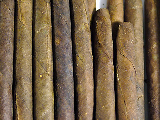 Image showing Dissimilarity of identical things. (Cigars pattern)