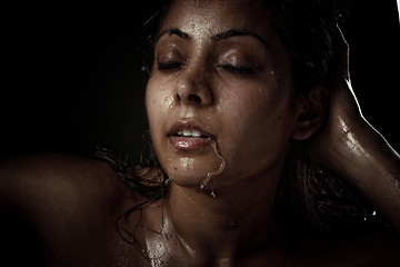 Image showing Portrait of beautiful young woman with wet face