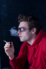 Image showing smoking a cigarette