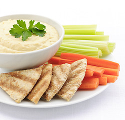 Image showing Hummus with pita bread and vegetables