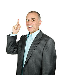 Image showing Businessman pointing up