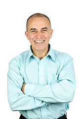 Image showing Smiling man with arms crossed