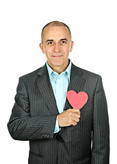 Image showing Man with paper heart on white background