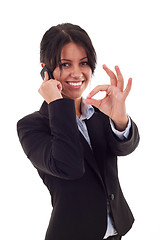 Image showing woman with phone and ok sign