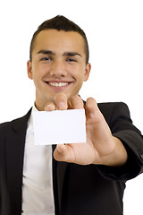 Image showing  man holding out a blank card