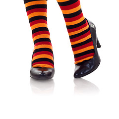 Image showing feet wearing colored socks in high heels
