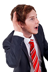Image showing Young businessman  listening