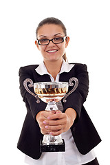 Image showing  woman handing out a gold trophy