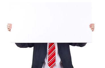 Image showing business man holding banner