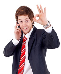 Image showing man on the phone approving 