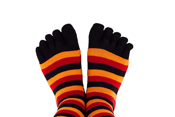 Image showing feet wearing colored socks