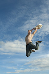 Image showing Man jumps on background sky