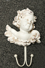 Image showing Hatrack in the manner of sculptures of the angel