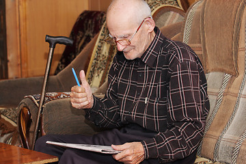 Image showing Senior man gesturing thumb up