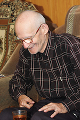 Image showing Smiling senior man with tea