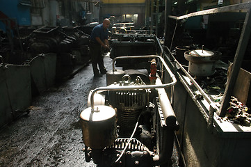 Image showing Workers at factory