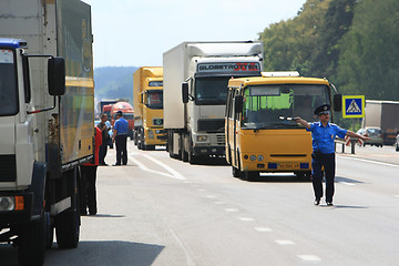 Image showing Policeman on the road