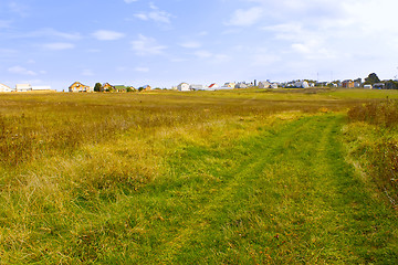 Image showing The road through meadows