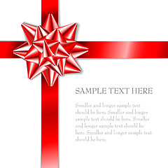 Image showing Red bow on a red ribbon with white background