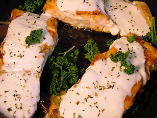 Image showing Salmon fried under white sauce