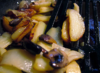 Image showing Potato fried with mushrooms and an onions