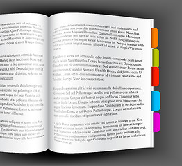 Image showing Open book with colorful bookmarks