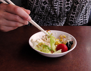 Image showing Eating salad