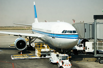 Image showing Airplane parking at gate