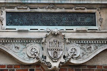 Image showing The plaque in the wall of St Mary's Church in Cracow