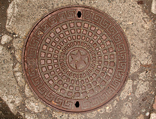 Image showing Manhole with star