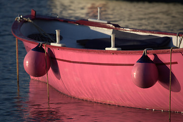 Image showing a pink boat