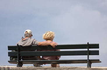 Image showing an elderly couple sitting on a bench