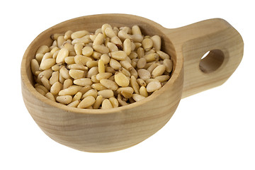 Image showing scoop of pine nuts