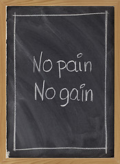 Image showing no pain, no gain exercise motto on blackboard