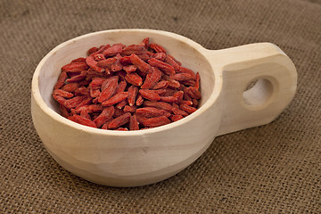 Image showing scoop of dried Tibetan goji berries (wolfberries)