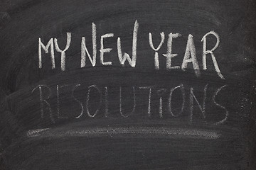 Image showing forgetting new year resolutions - concept on blackboard