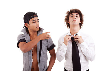 Image showing young latin men, gesturing  with a finger - removing something from the shoulder (a white boy), 